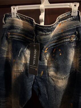 Rockstar Men’s Slim Straight Jeans in Washed Blue with Paint-Splatter